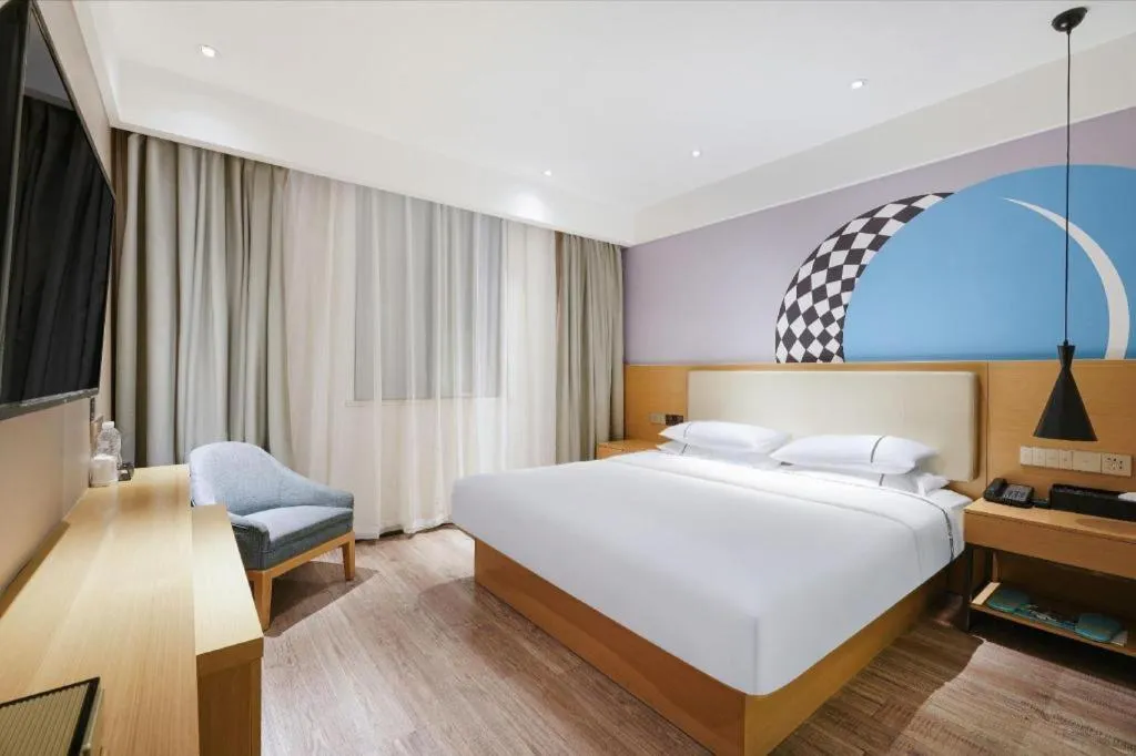 Bed in City Comfort Inn Guangzhou Shixi Metro Station Pazhou Exhibition