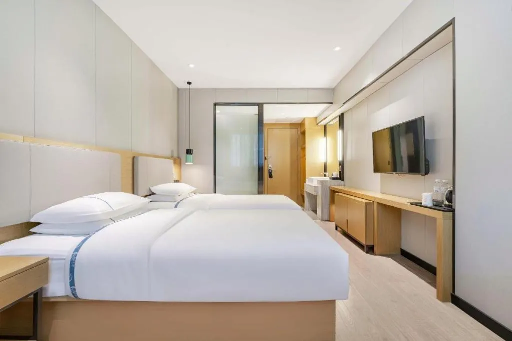 Bed in City Comfort Inn Guangzhou Shixi Metro Station Pazhou Exhibition