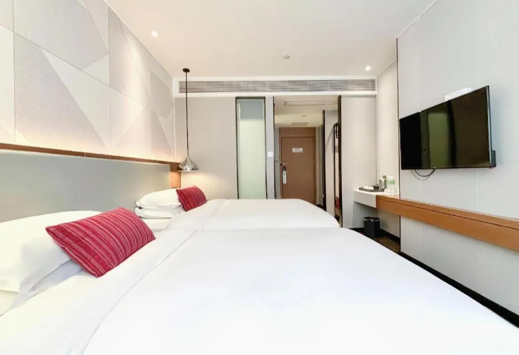 Bed in Borrman Hotel Guigang Pingnan Donghu