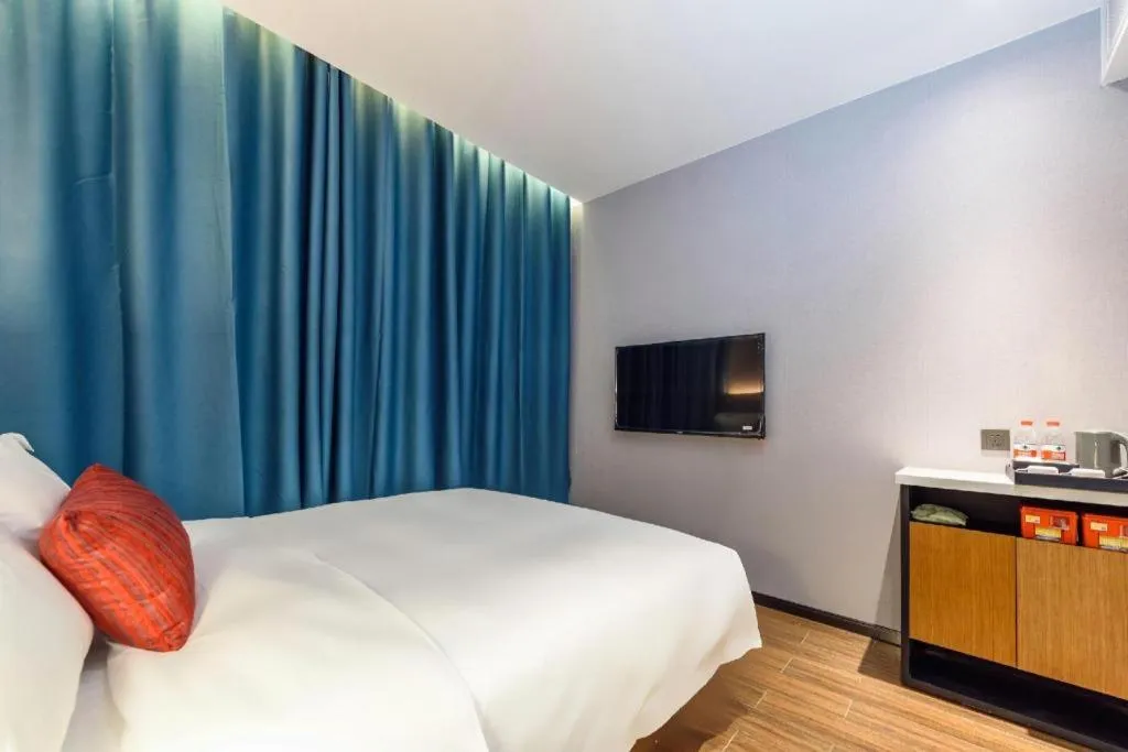 Bed in Borrman Hotel Guigang Pingnan Donghu