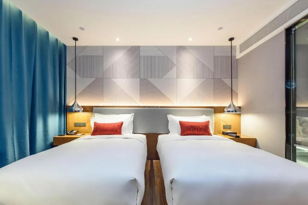 Bed in Borrman Hotel Guigang Pingnan Donghu