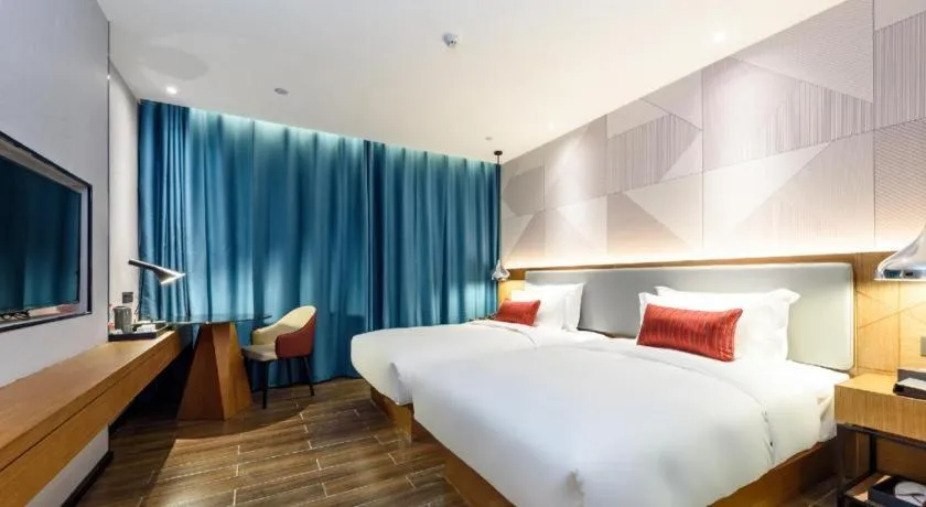 Bed in Borrman Hotel Guigang Pingnan Donghu