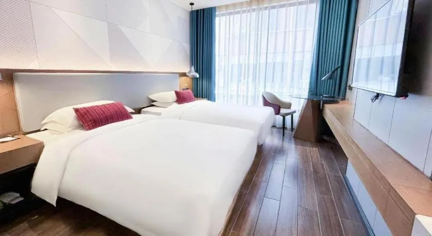 Bed in Borrman Hotel Guigang Pingnan Donghu