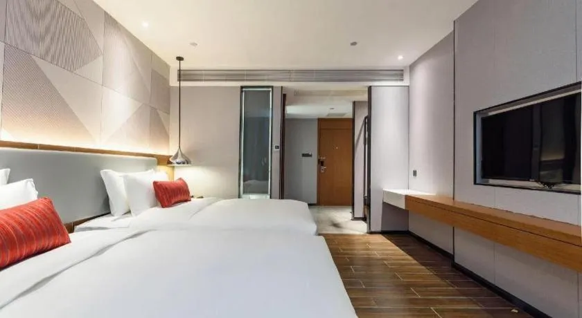 Bed in Borrman Hotel Guigang Pingnan Donghu