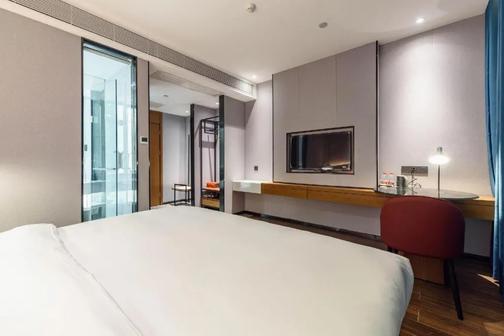 Bed in Borrman Hotel Guigang Pingnan Donghu