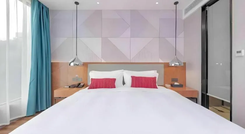 Bed in Borrman Hotel Guigang Pingnan Donghu