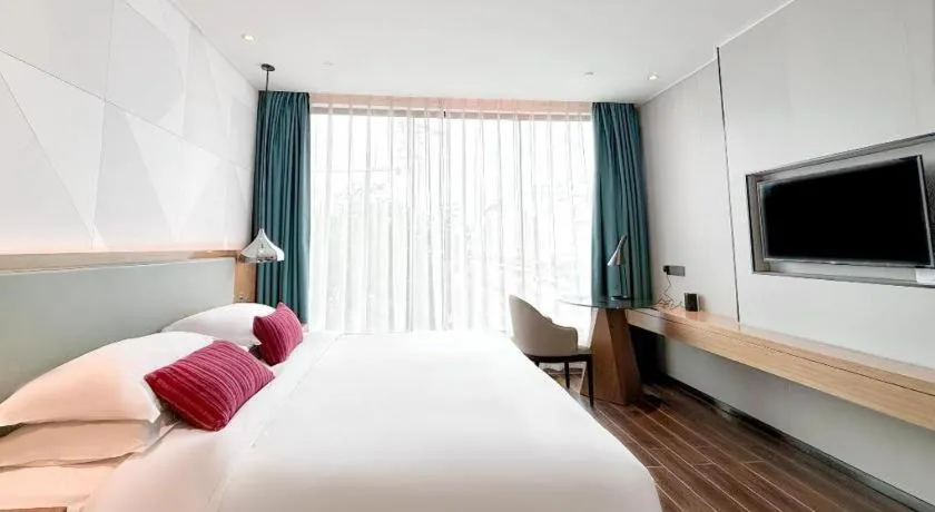 Bed in Borrman Hotel Guigang Pingnan Donghu