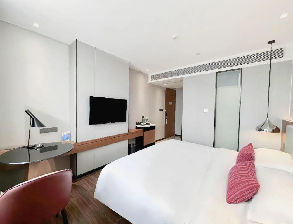 Bed in Borrman Hotel Guigang Pingnan Donghu