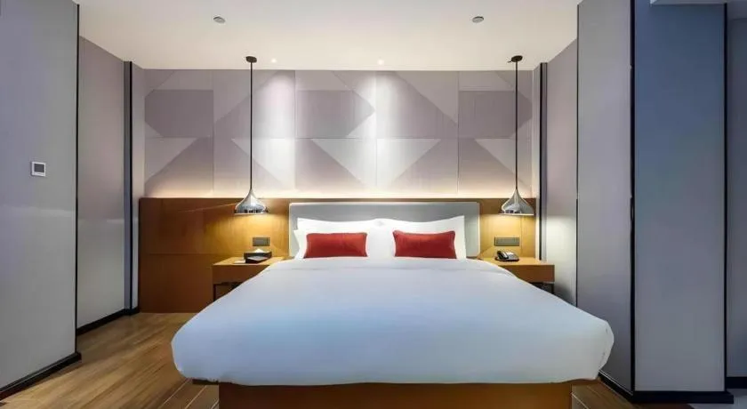 Bed in Borrman Hotel Guigang Pingnan Donghu