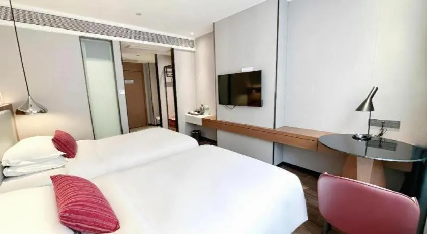 Bed in Borrman Hotel Guigang Pingnan Donghu