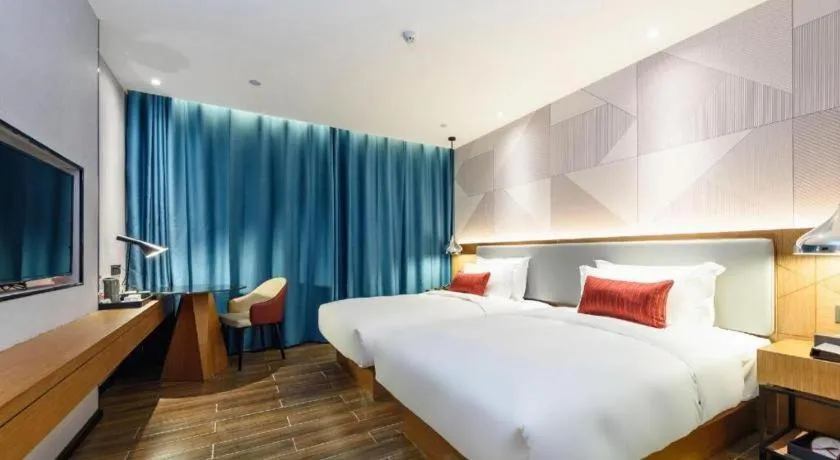 Bed in Borrman Hotel Guigang Pingnan Donghu