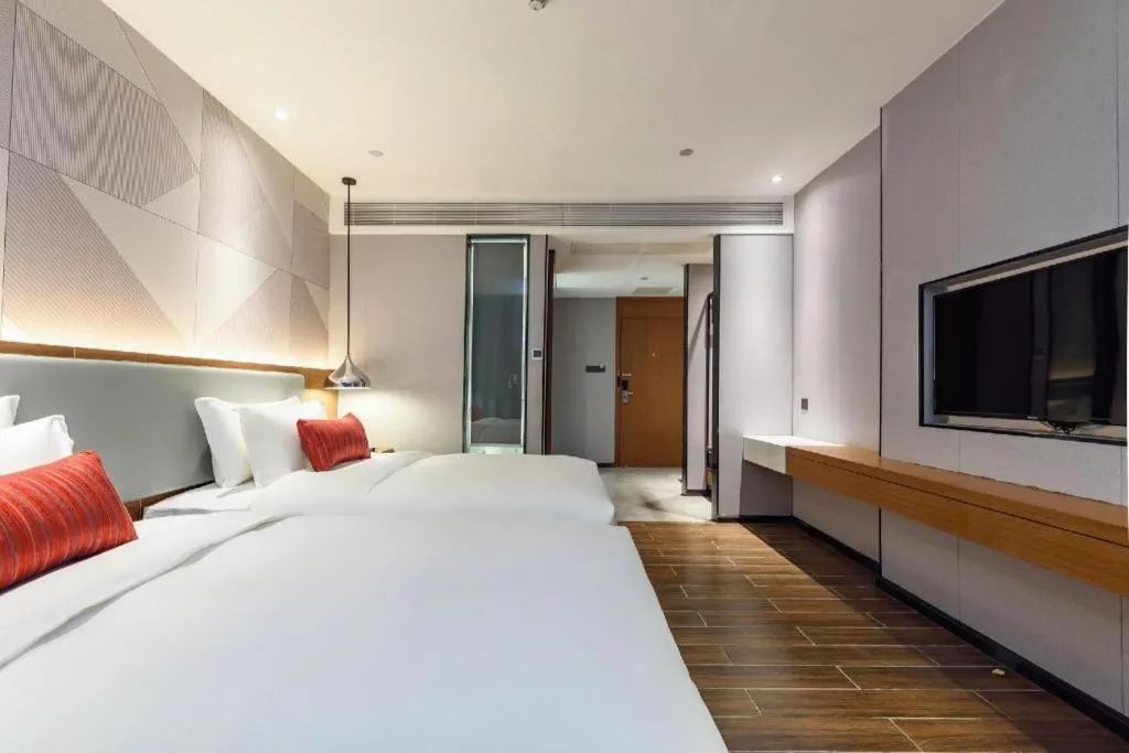 Bed in Borrman Hotel Guigang Pingnan Donghu