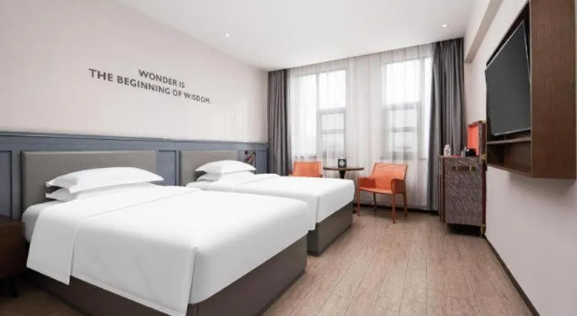 Bed in City Comfort Premier Hotel Wuhan Wangjiawan Hanyang Bus Station Metro Station