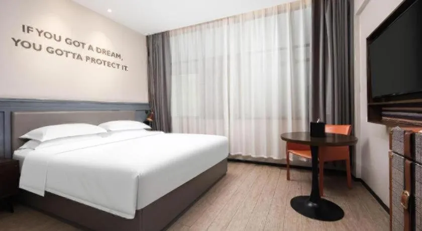 Bed in City Comfort Premier Hotel Wuhan Wangjiawan Hanyang Bus Station Metro Station