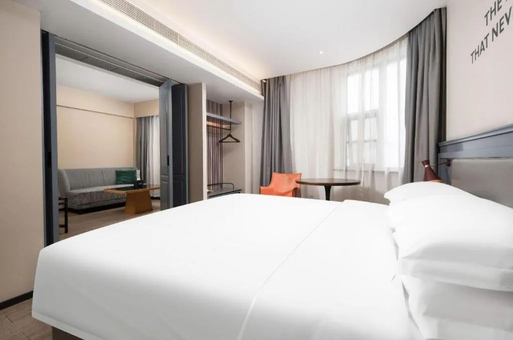 Bed in City Comfort Premier Hotel Wuhan Wangjiawan Hanyang Bus Station Metro Station