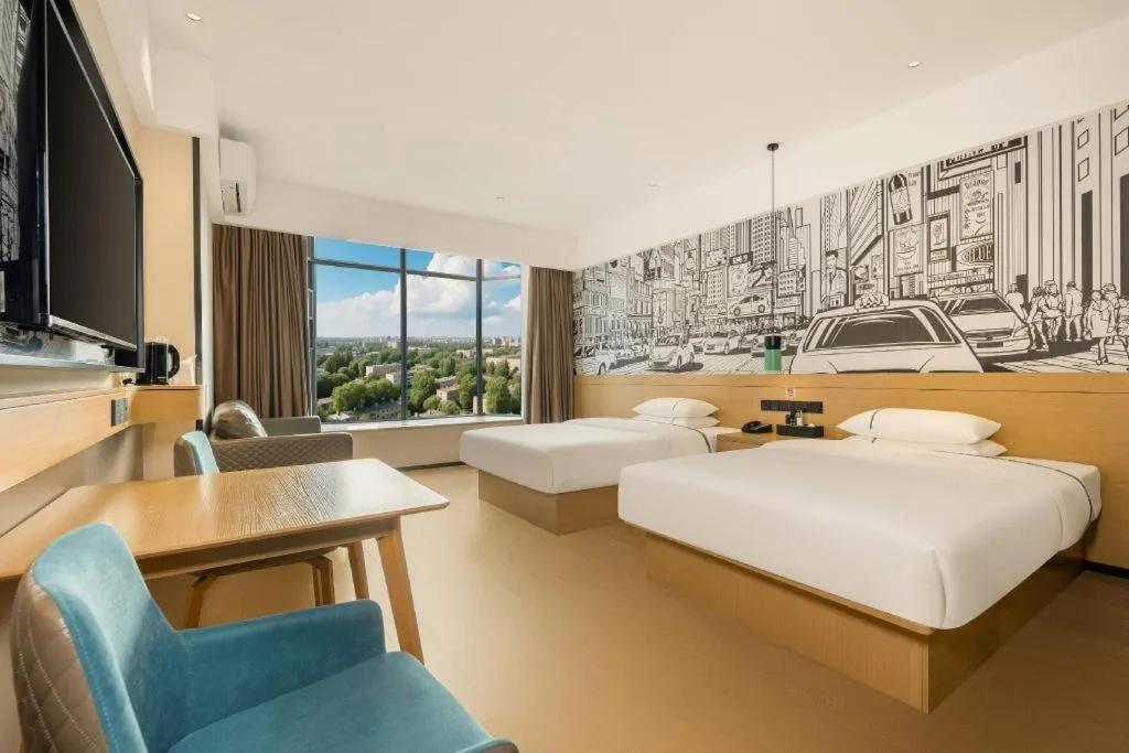 Bed in City Comfort Inn Dandong Railway Station Yalu River Scenic Area