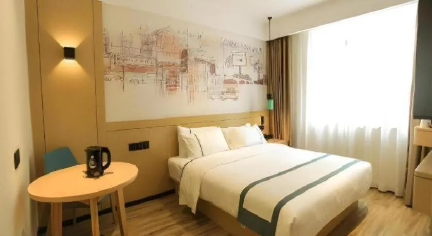 Bed in City Comfort Inn Nanchang Zhangshulin Shashagou Metro Station