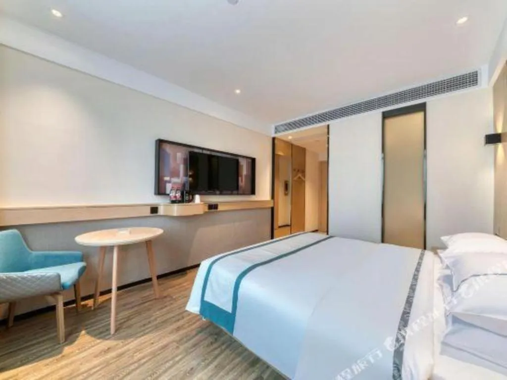 Bed in City Comfort Inn Nanchang Zhangshulin Shashagou Metro Station