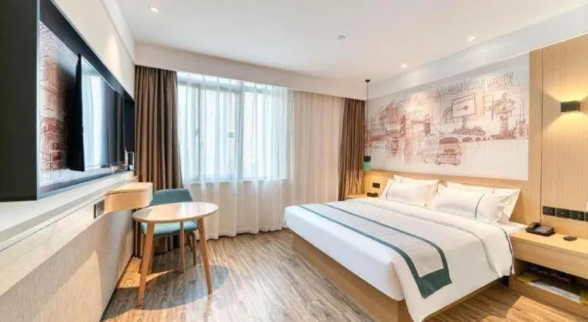 Bed in City Comfort Inn Nanchang Zhangshulin Shashagou Metro Station