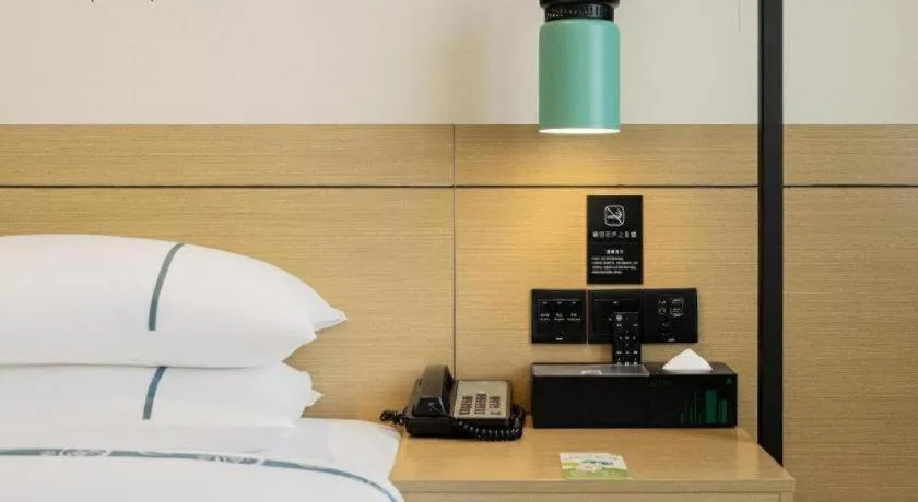 Bed in City Comfort Inn Nanchang Zhangshulin Shashagou Metro Station