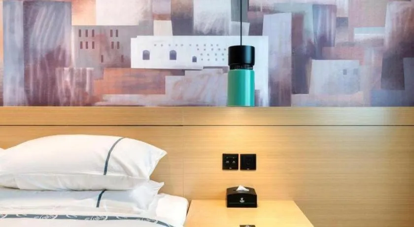 Bed in City Comfort Inn Nanchang Zhangshulin Shashagou Metro Station