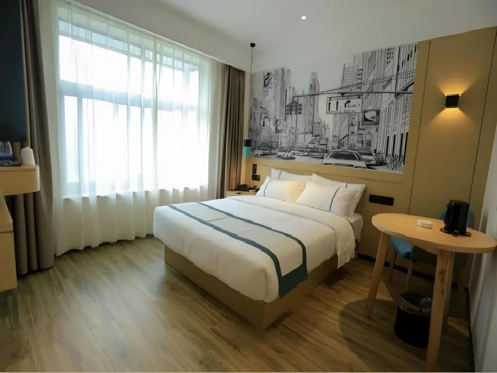 Bed in City Comfort Inn Nanchang Zhangshulin Shashagou Metro Station