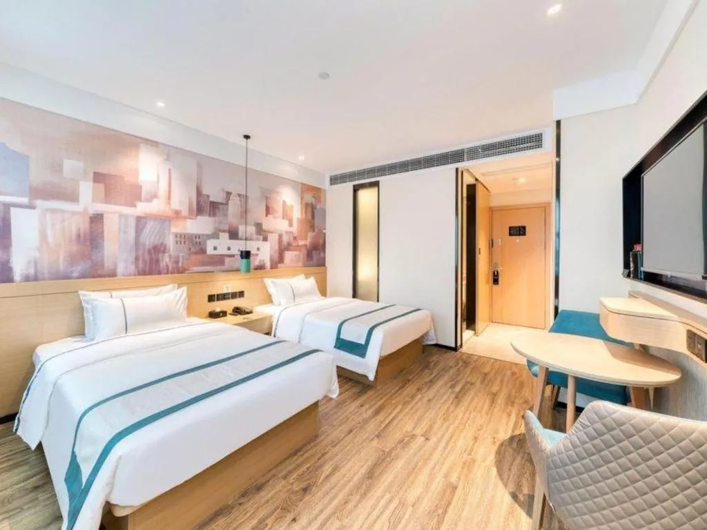 Bed in City Comfort Inn Nanchang Zhangshulin Shashagou Metro Station