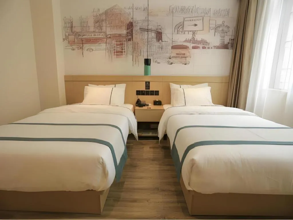 Bed in City Comfort Inn Nanchang Zhangshulin Shashagou Metro Station