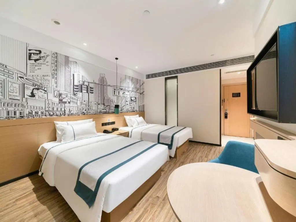 Bed in City Comfort Inn Nanchang Zhangshulin Shashagou Metro Station