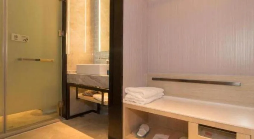 Bed in Echarm Hotel Changsha Wuyi Square Railway Metro Station