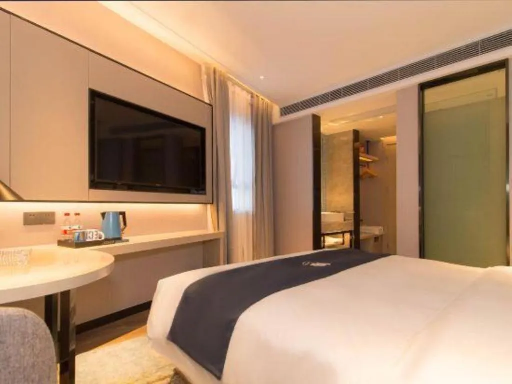 Bed in Echarm Hotel Changsha Wuyi Square Railway Metro Station