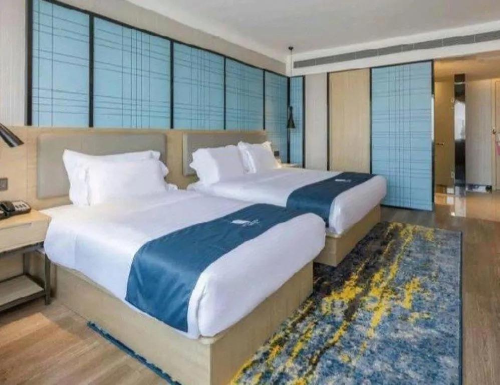 Bed in Echarm Hotel Changsha Wuyi Square Railway Metro Station