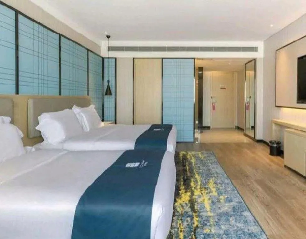 Bed in Echarm Hotel Changsha Wuyi Square Railway Metro Station