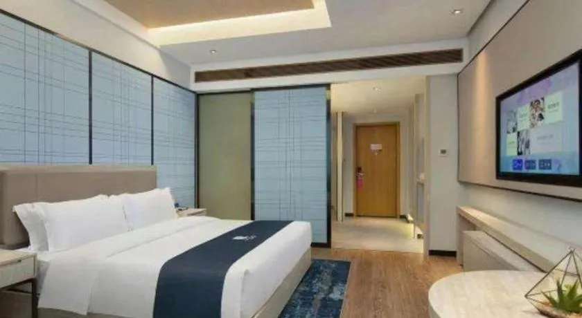 Bed in Echarm Hotel Changsha Wuyi Square Railway Metro Station