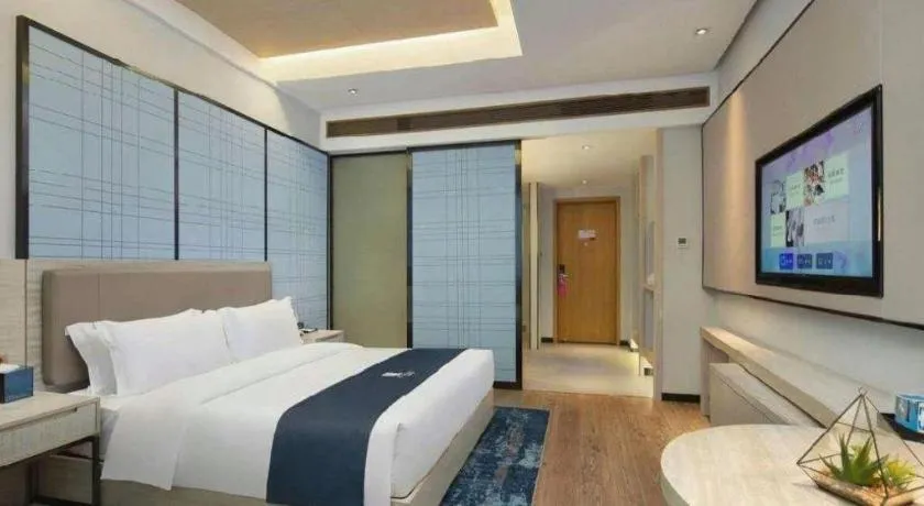 Bed in Echarm Hotel Changsha Wuyi Square Railway Metro Station