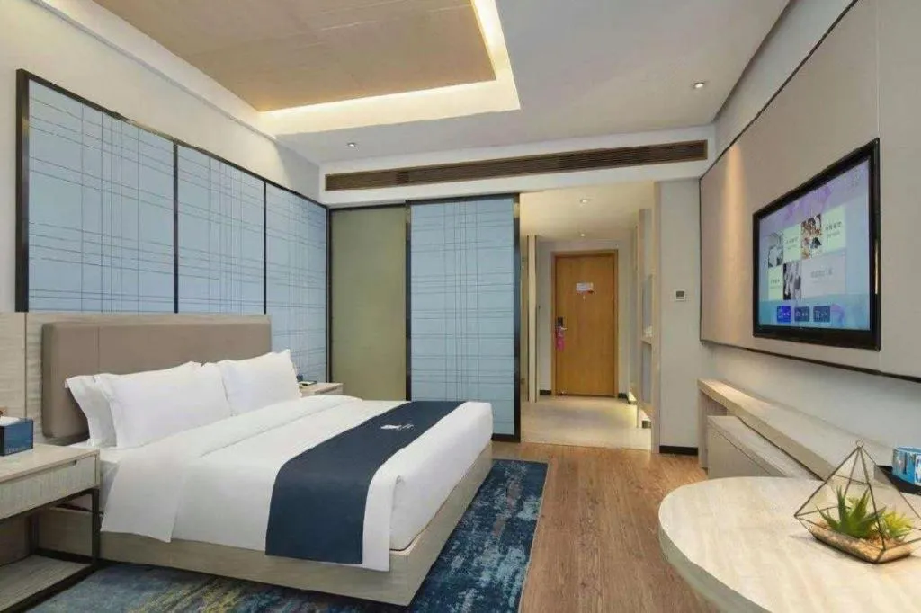 Bed in Echarm Hotel Changsha Wuyi Square Railway Metro Station