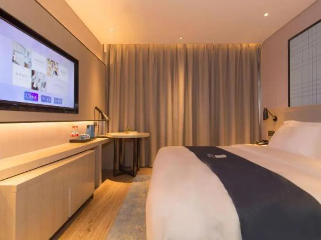 Bed in Echarm Hotel Changsha Wuyi Square Railway Metro Station
