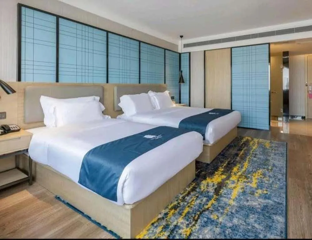 Bed in Echarm Hotel Changsha Wuyi Square Railway Metro Station