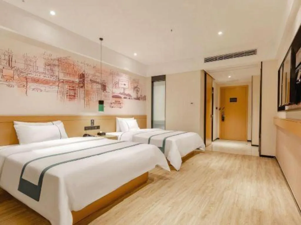 Bed in City Comfort Inn Dongguan Dalingshan Xinli Agricultural Wholesale