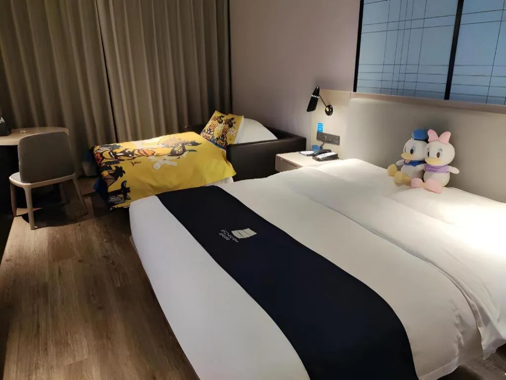 Bed in Echarm Hotel Nanchang Bayi Square Metro Station Wushang MALL