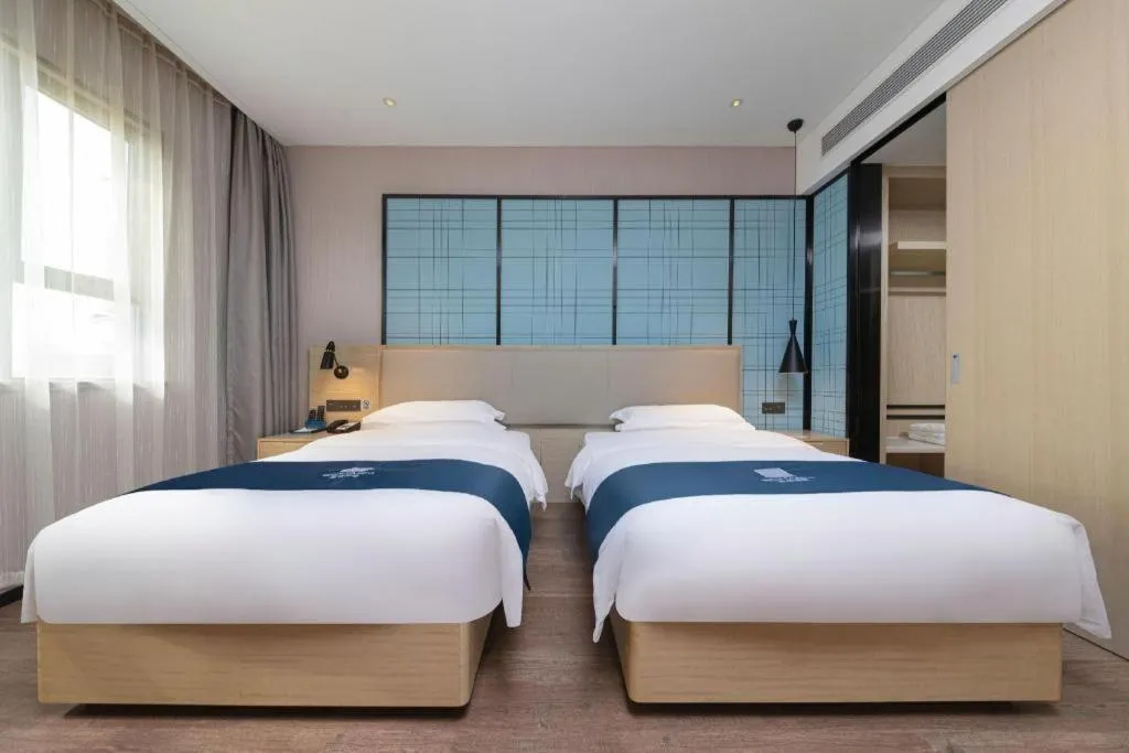 Bed in Echarm Hotel Nanchang Bayi Square Metro Station Wushang MALL