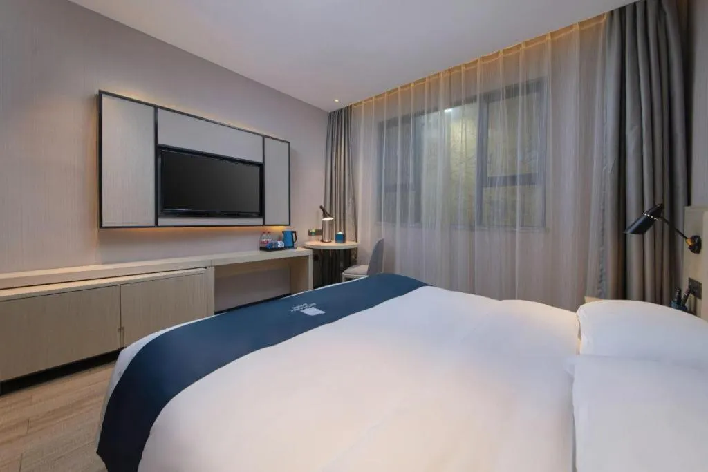 Bed in Echarm Hotel Nanchang Bayi Square Metro Station Wushang MALL