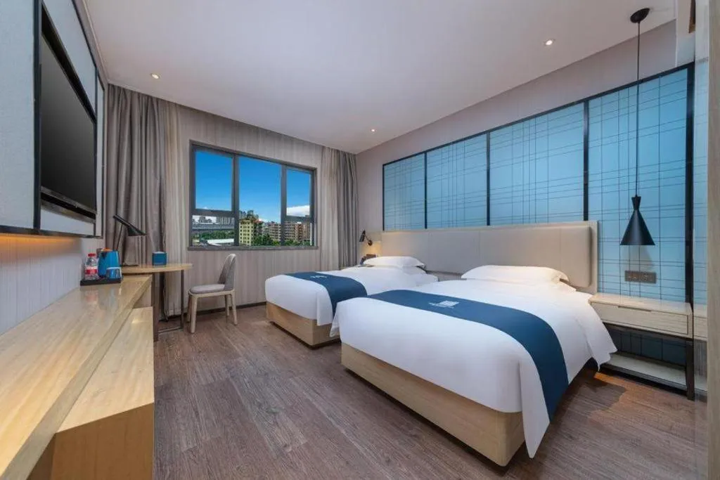 Bed in Echarm Hotel Nanchang Bayi Square Metro Station Wushang MALL