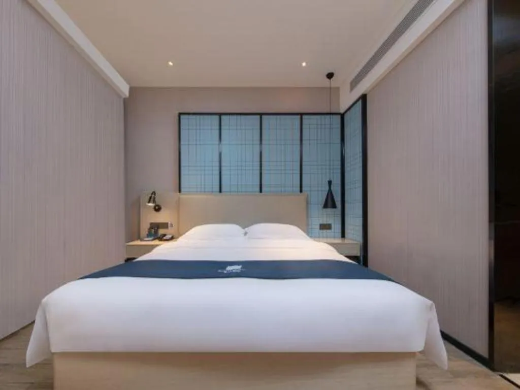 Bed in Echarm Hotel Nanchang Bayi Square Metro Station Wushang MALL