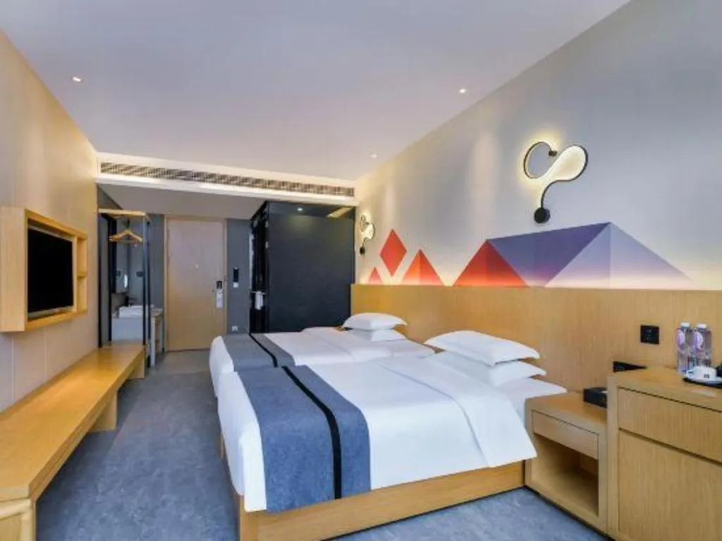 Bed in Borrman Hotel Chongqing Liberation Monument Hongyadong