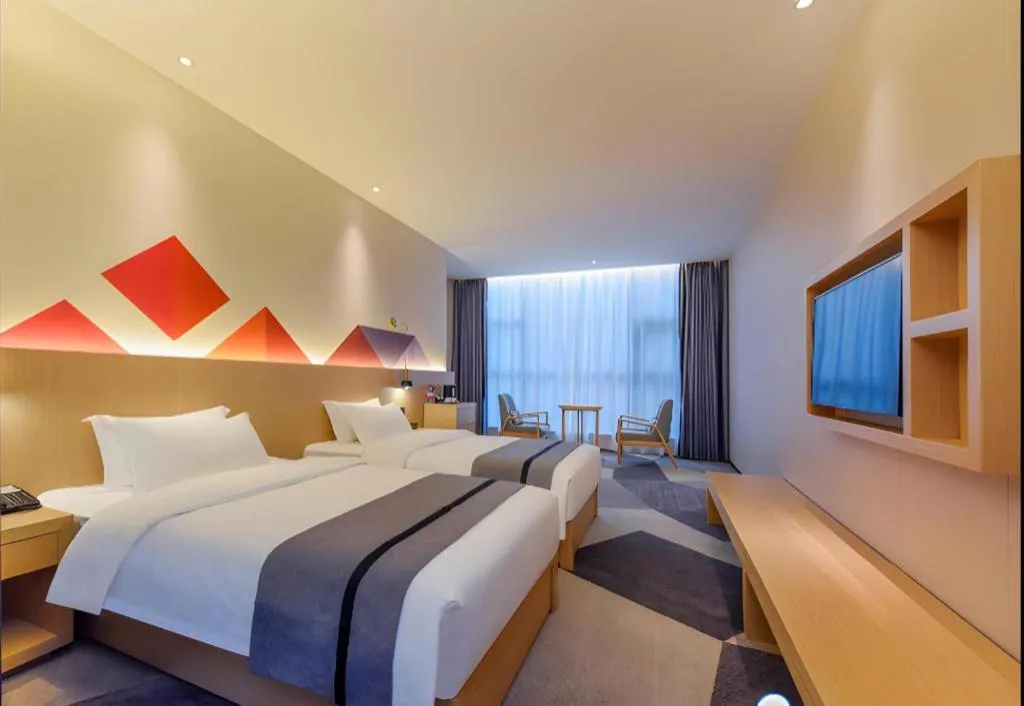 Bed in Borrman Hotel Chongqing Liberation Monument Hongyadong