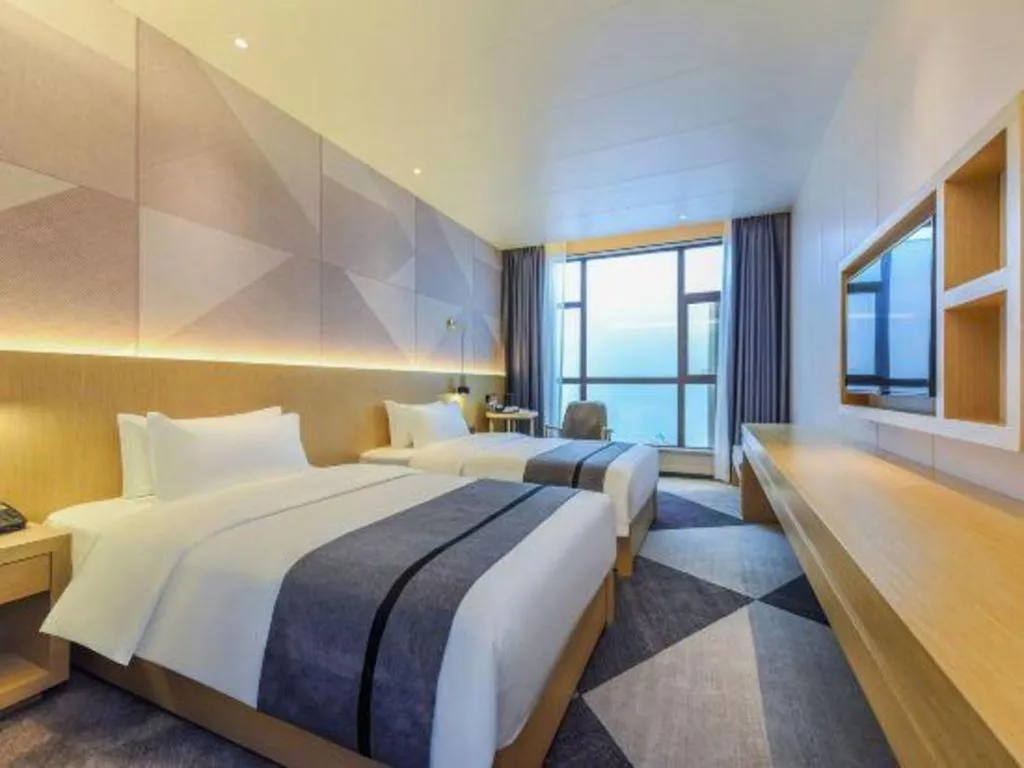 Bed in Borrman Hotel Chongqing Liberation Monument Hongyadong