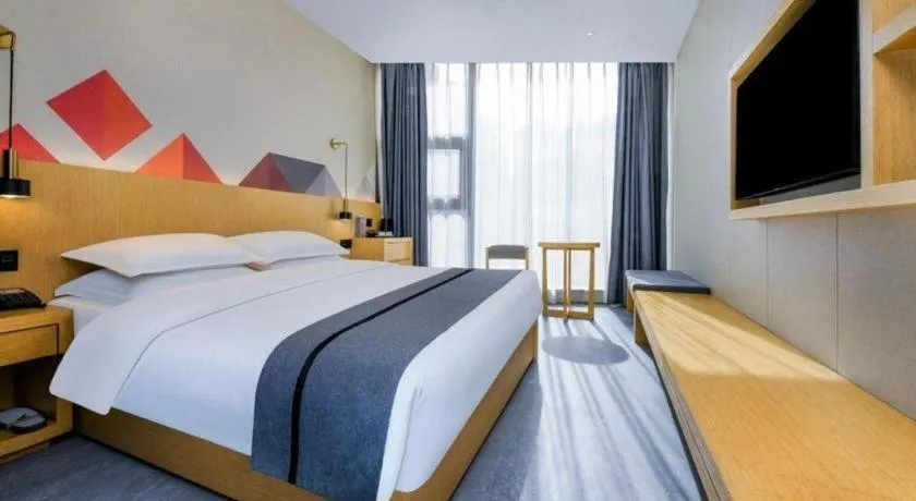 Bed in Borrman Hotel Chongqing Liberation Monument Hongyadong