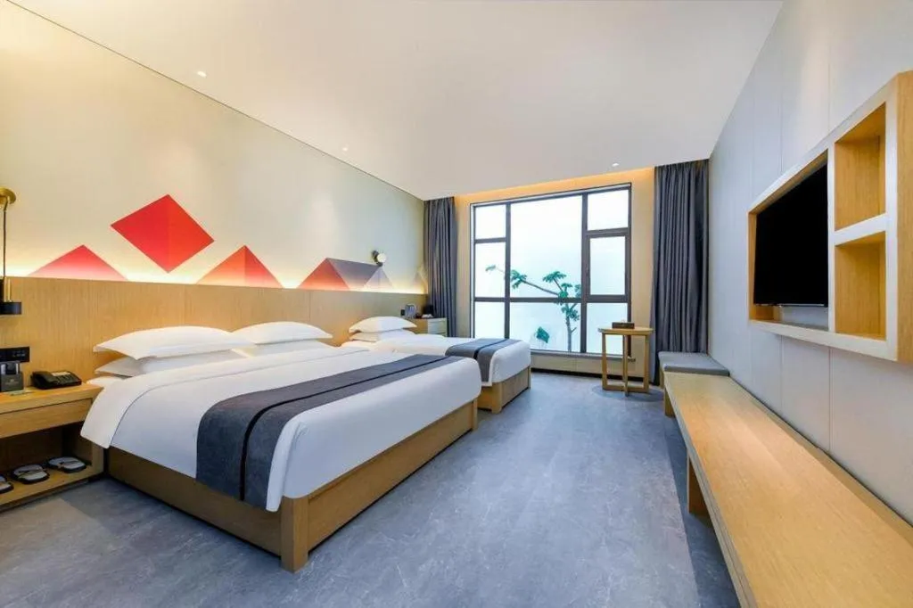 Bed in Borrman Hotel Chongqing Liberation Monument Hongyadong