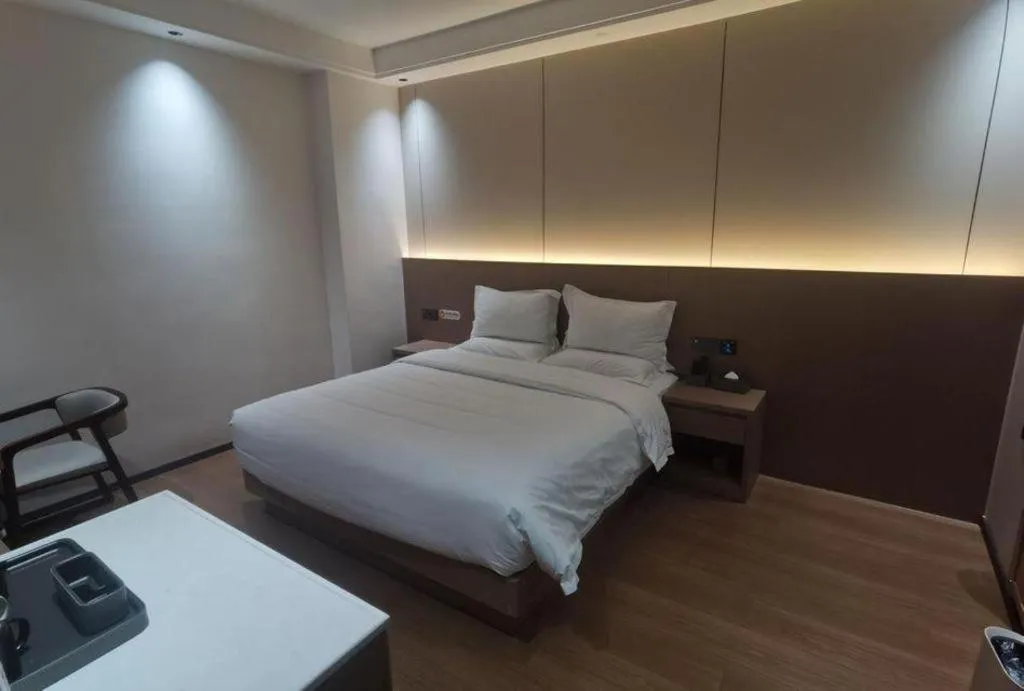 Bed in Borrman Hotel Chongqing Liberation Monument Hongyadong